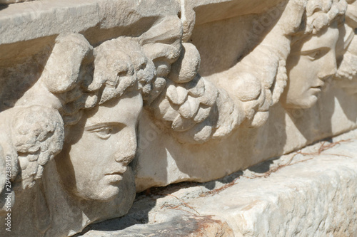 Sculpted Greek mask recovered from the ruins of the theater photo