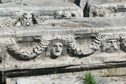 Sculpted Greek mask recovered from the ruins of the theater photo