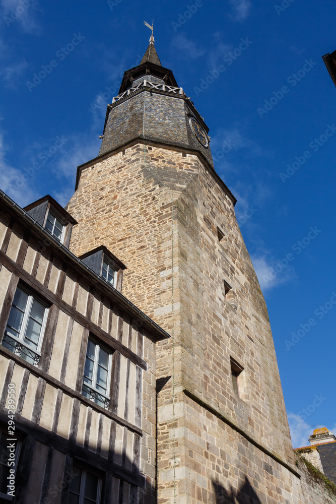 Clock tower and half-timbered house in the clock street in Dinan