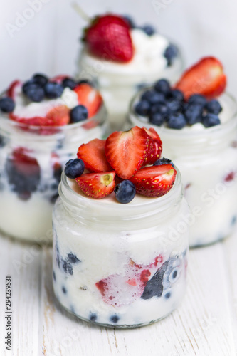 blanmange with cottage cheese, milk, gelatin and strawberries with blueberries