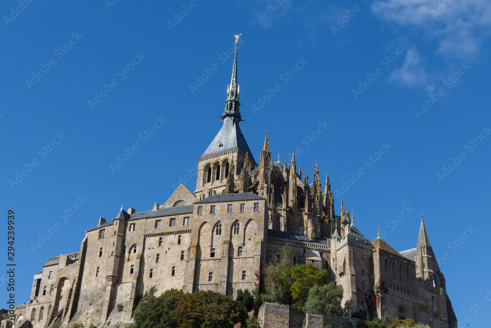 Abbey of Mont Saint-Michel against blue sky