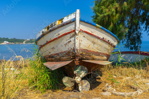 old wooden fishing boat by the sea  Greece