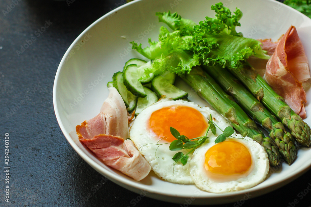 healthy breakfast (fried eggs, bacon, vegetables, asparagus beans, coffee and more) menu concept. food background. copy space. Top view healthy breakfast (fried eggs, bacon, vegetables, asparagus beans, coffee and more) menu concept. food background. copy space. Top view