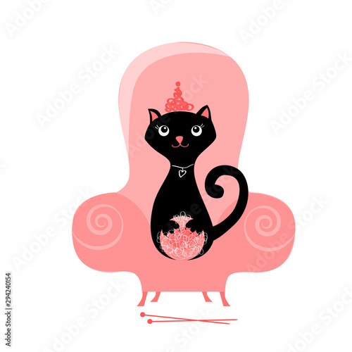 Cat in a chair with a ball of thread