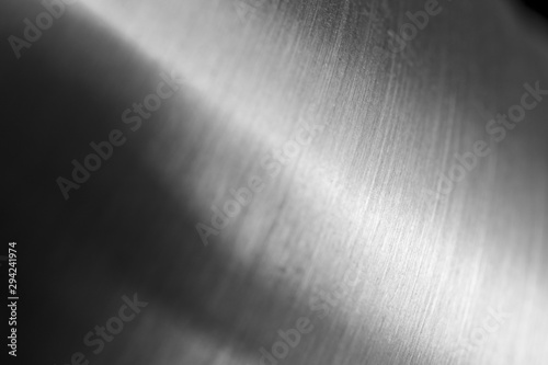Abstract metal macro background with selective focus. Silver metallic texture, close-up