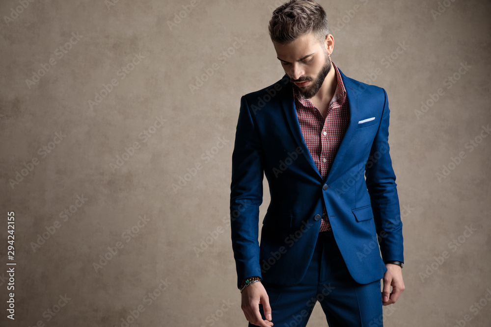 businessman standing and looking down sad businessman standing and looking down sad