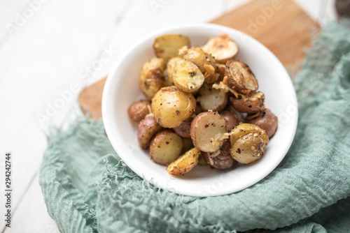 Delicious Roasted mini potato with spices and Parmesan cheese  cut in halves