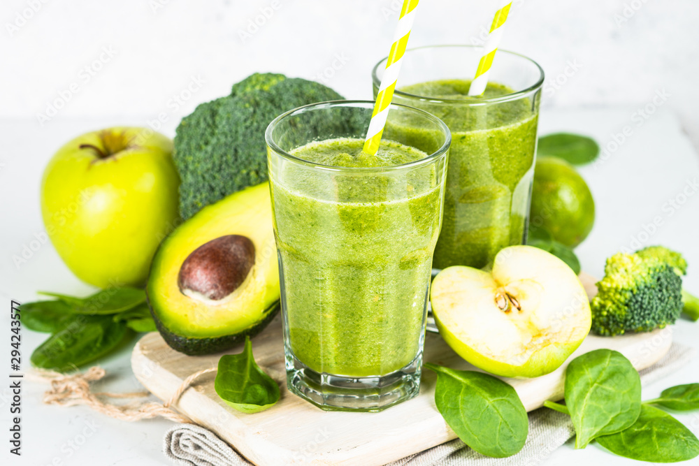 Green smoothie from fruit and vegetable on white. Green smoothie from fruit and vegetable on white.