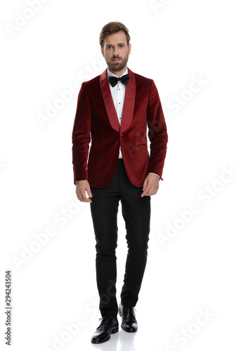 fashion man wearing red velvet tuxedo and bowtie © Viorel Sima
