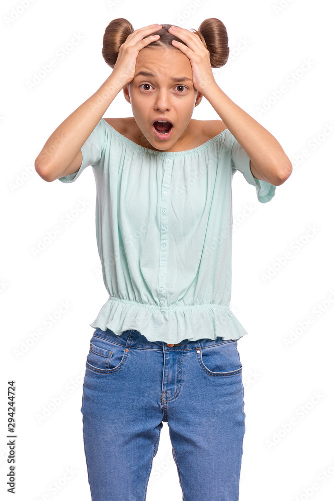 Portrait of surprised teen girl, isolated on white background. Funny child looking at camera in amazement, touching head with hands. Beautiful caucasian teenager, opening eyes and mouth with shock. Portrait of surprised teen girl, isolated on white background. Funny child looking at camera in amazement, touching head with hands. Beautiful caucasian teenager, opening eyes and mouth with shock.