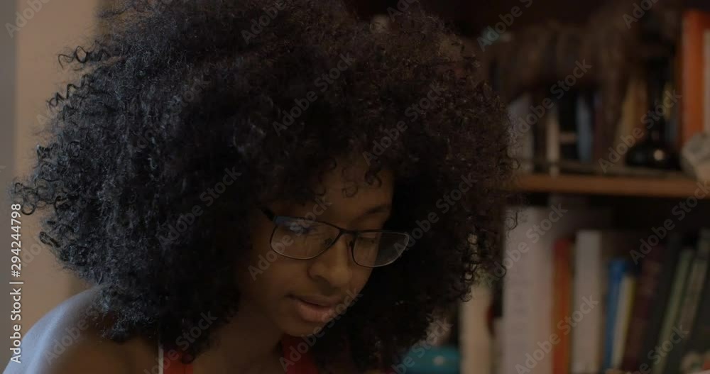 Close Up Millennial African American Woman Working in Study Close Up Millennial African American Woman Working in Study