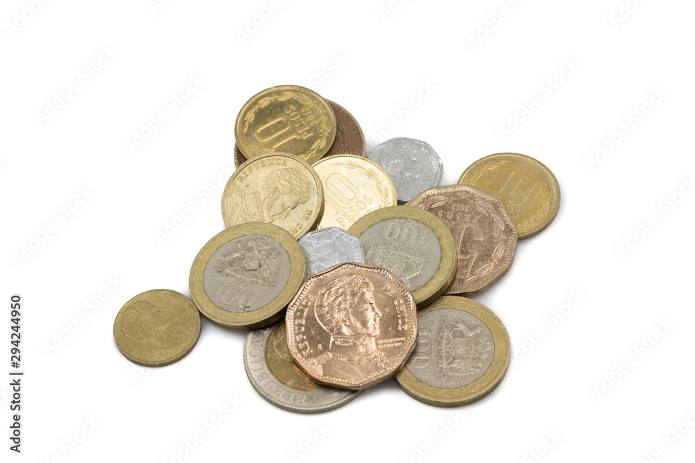 A pile of assorted coins from Chile, shot close up in macro, isolated on a clean, white, pure background A pile of assorted coins from Chile, shot close up in macro, isolated on a clean, white, pure background