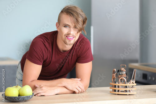 Portrait of young transgend...