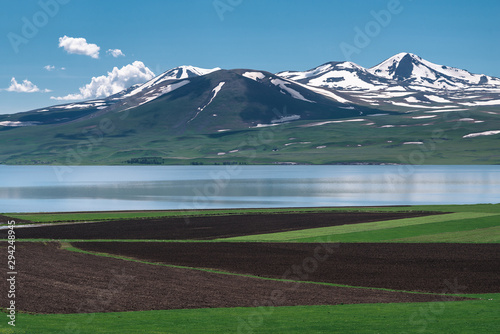 Fototapeta Naklejka Na Ścianę i Meble -  Lake Paravani in Georgia, Caucasus. The largest lake in Georgia at an altitude of more than 2000 meters.