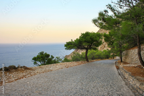 Road leading to Profitis Ilias - the highest peak of the Greek island of Santorini