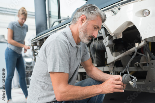 a male bus mechanic at work