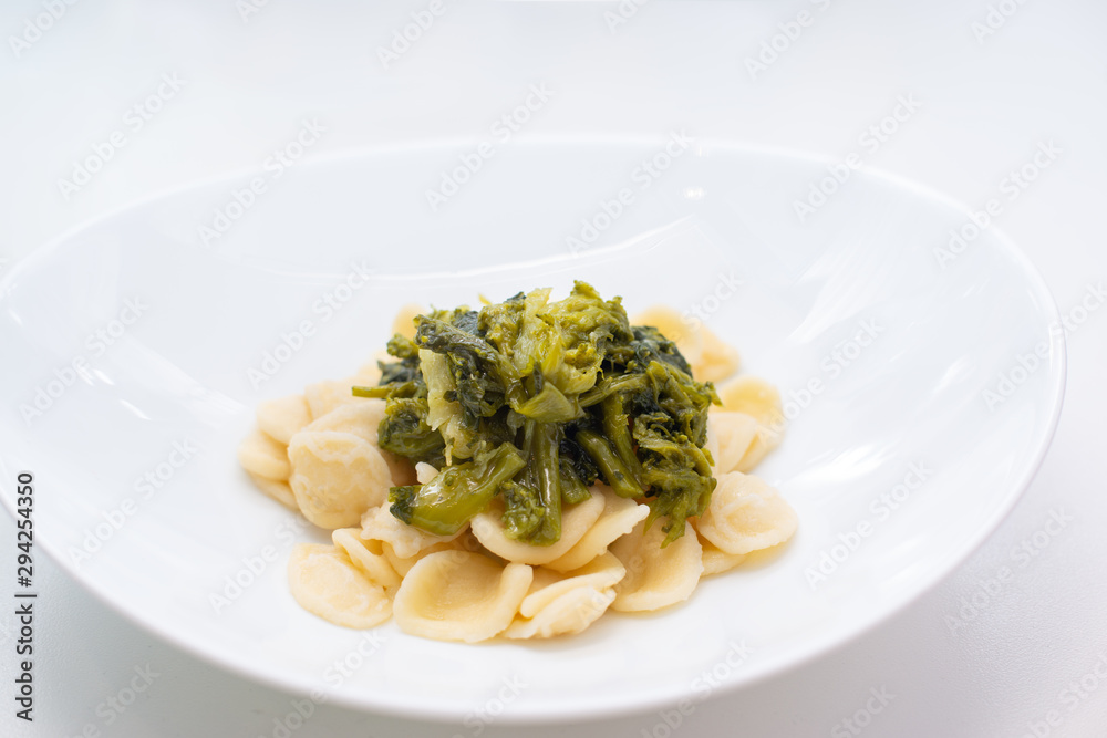 orecchiette alla pugliese, homemade Italian pasta. Orecchiette with turnip tops
