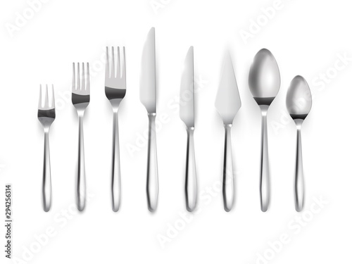 Realistiny set of silver cutlery.Top view. Metal knives, forks spoons