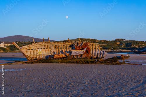 Bad Eddie, Cara na mara, abandoned wreck at Bun beg, Gweedore, county donegal, Ireland on the wild atlantic way with a full moon  photo