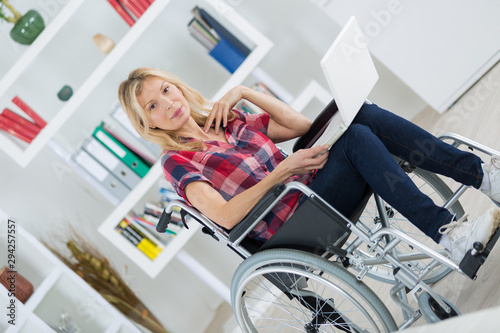 female web surfing in wheelchair