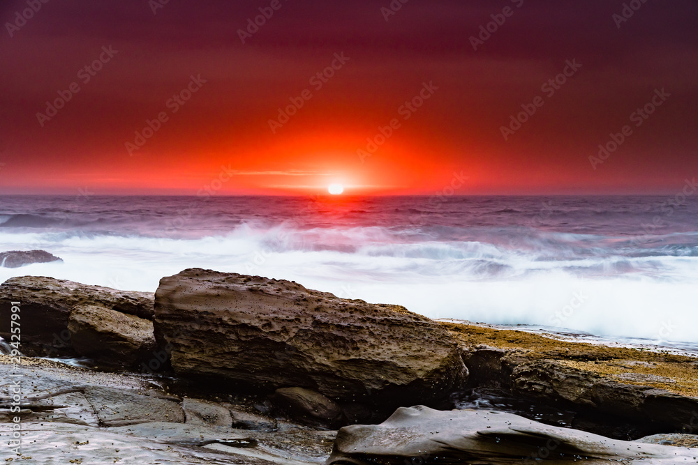 Moody Sunrise Rocky Seascape