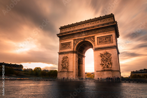 World famous Arc de Triomphe at the city center of Paris, France.