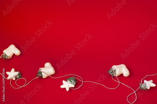 Christmas and New Year white decorations on a red background. Horisontal