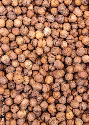 Heap of Walnuts for background texture  close-up  top view  copy space for text