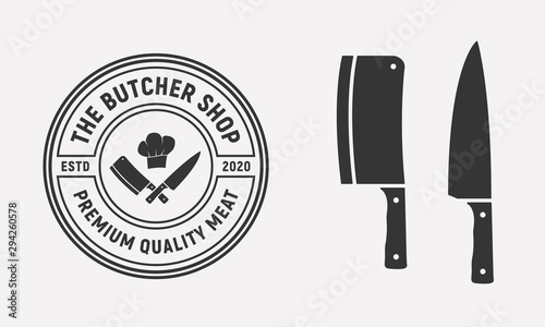 The Butcher Shop vintage logo design with meat cleaver and chef knife isolated on white background. Vector illustration