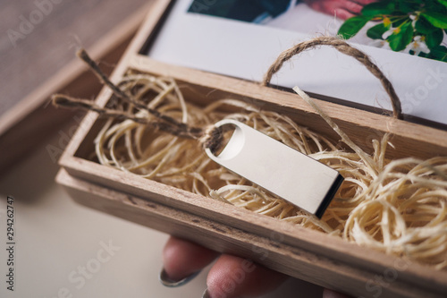 Wooden retro brown box with usb flash card
