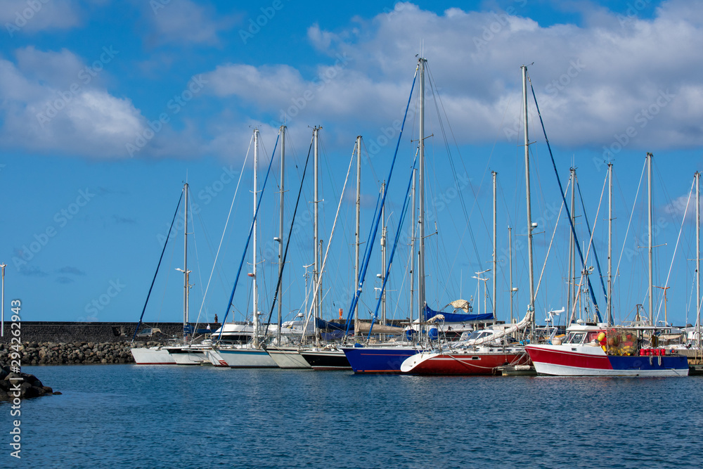 Row of sail boats at Saint Pierre harbor on Réunion Island