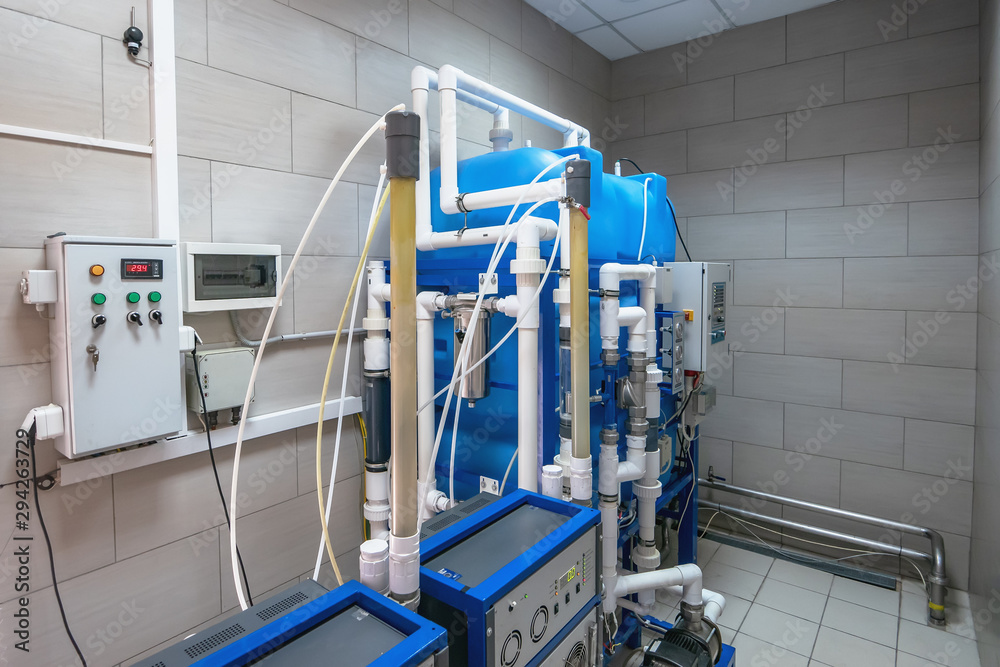 Automated computerized ozone generator machine for ozonation of pure clean drinking water in water production factory Automated computerized ozone generator machine for ozonation of pure clean drinking water in water production factory