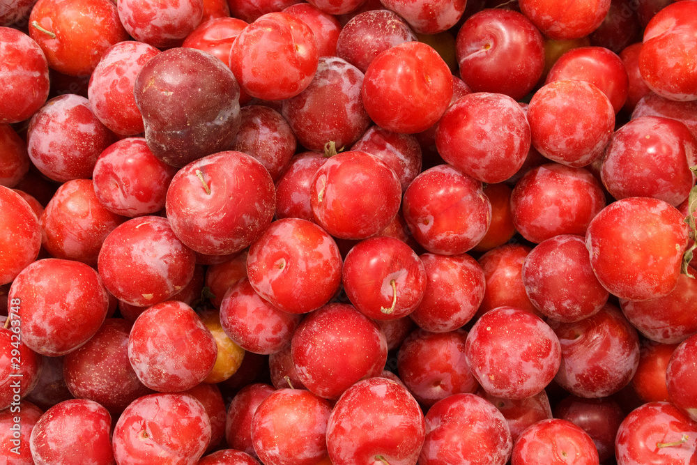 Tasty plums at local market or on the counter of the store