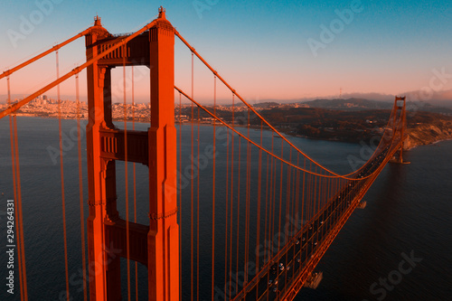 Beautiful aerial San Francisco view at early morning sunrise with Golden gate bridge and downtown.