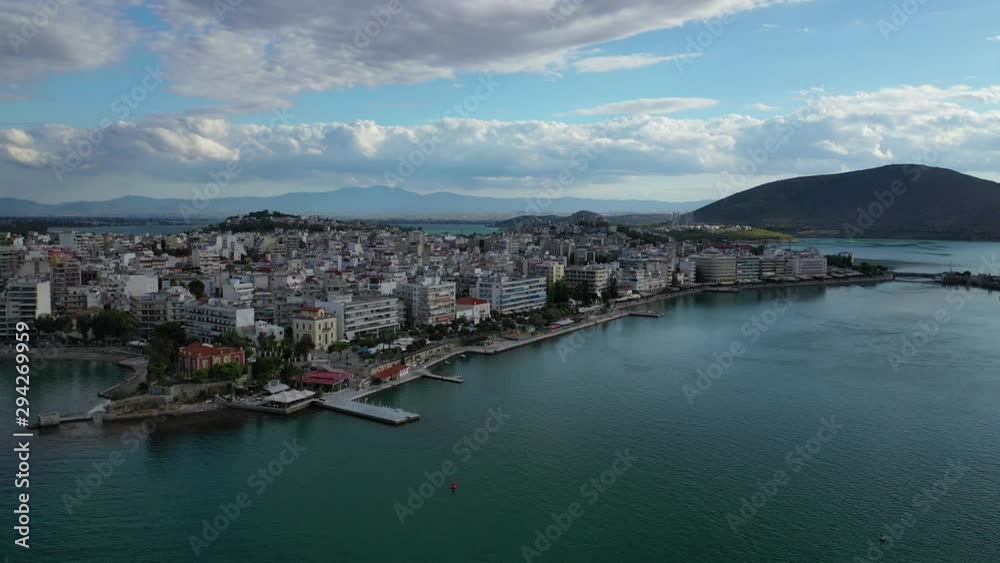 Aerial drone video of iconic town of Halkida or Chalkida with famous old bridge connecting Evoia island with mainland and beautiful clouds, Greece Aerial drone video of iconic town of Halkida or Chalkida with famous old bridge connecting Evoia island with mainland and beautiful clouds, Greece