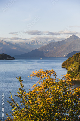 Autumn postcard view of Como lake - famous and popular Italian landmark