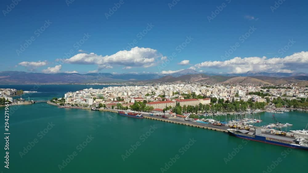 Aerial drone video of iconic town of Halkida or Chalkida with famous old bridge connecting Evoia