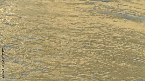 fast moving river close up eddies and currents