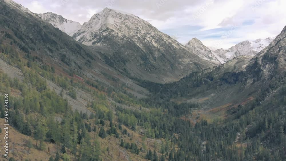 A smooth drone cinematic shot snow mountain hills, aerial view a snowy mountain peaks. A smooth drone cinematic shot snow mountain hills, aerial view a snowy mountain peaks.