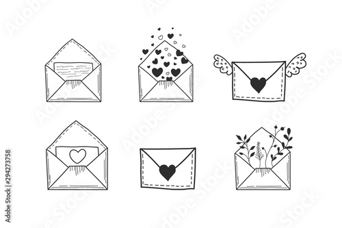 A set of envelopes. Vector illustration of hands in doodle style. Drawings of letters