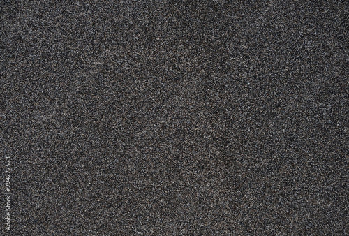 Mixed black and white sand, natural salt and pepper effect. photo