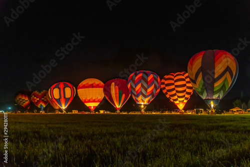Photography Hot air balloons during a night glow at a balloon festival in Grants Pass Oregon