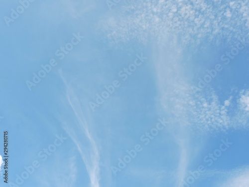 Blue sky background with clouds