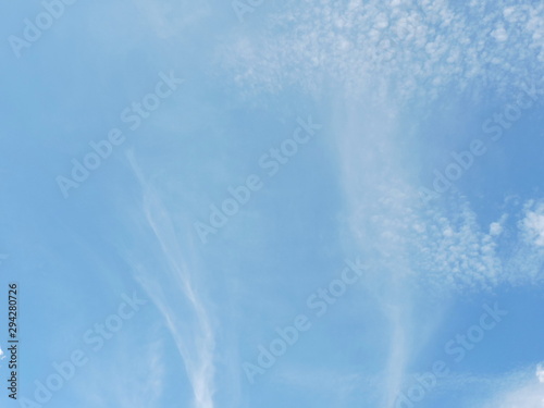 Blue sky background with clouds