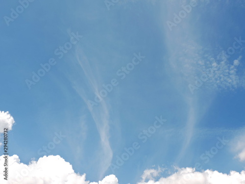 Blue sky background with clouds