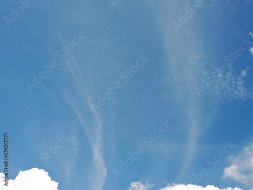 Blue sky background with clouds