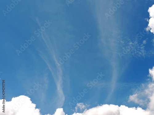 Blue sky background with clouds