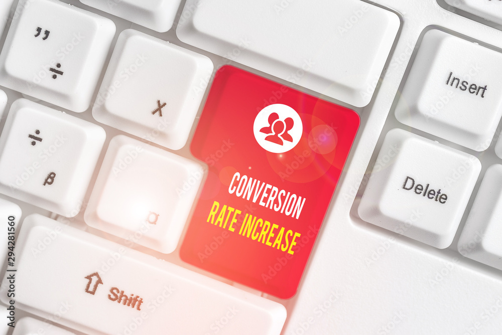 Text sign showing Conversion Rate Increase. Business photo text Ratio of Total Visitors who perform desired actions White pc keyboard with empty note paper above white background key copy space Text sign showing Conversion Rate Increase. Business photo text Ratio of Total Visitors who perform desired actions White pc keyboard with empty note paper above white background key copy space
