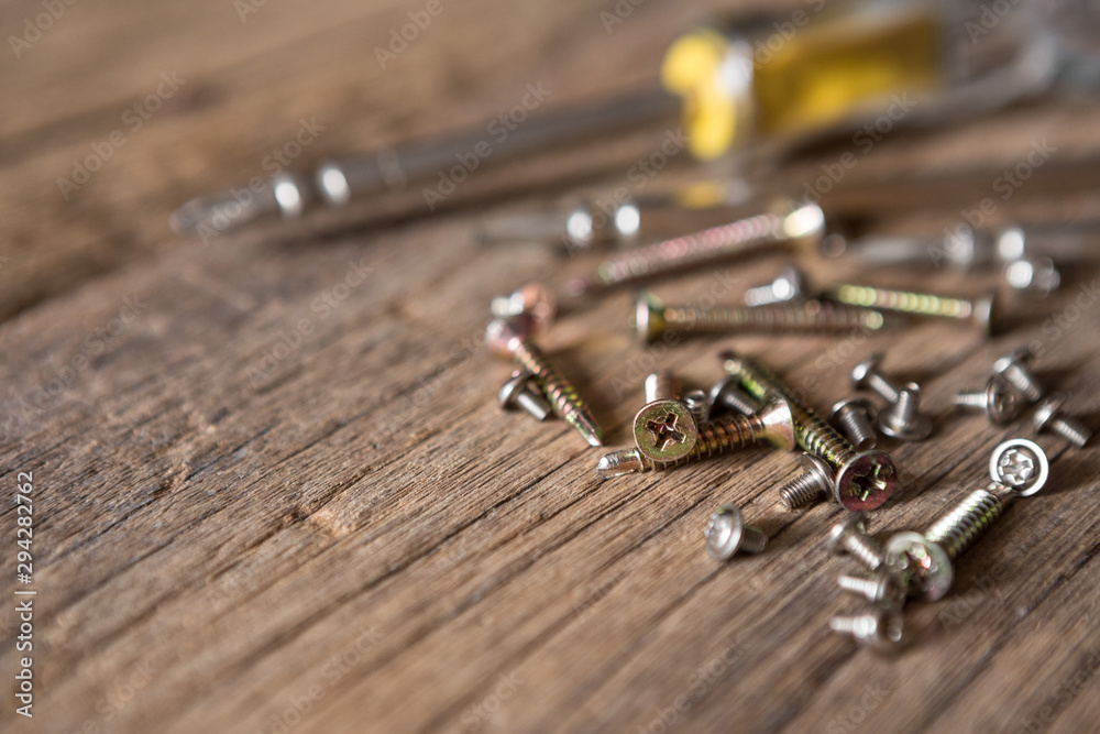 custom made wallpaper toronto digitalSelective focus of Many sizes screwdriver and screw nut on the  wood background