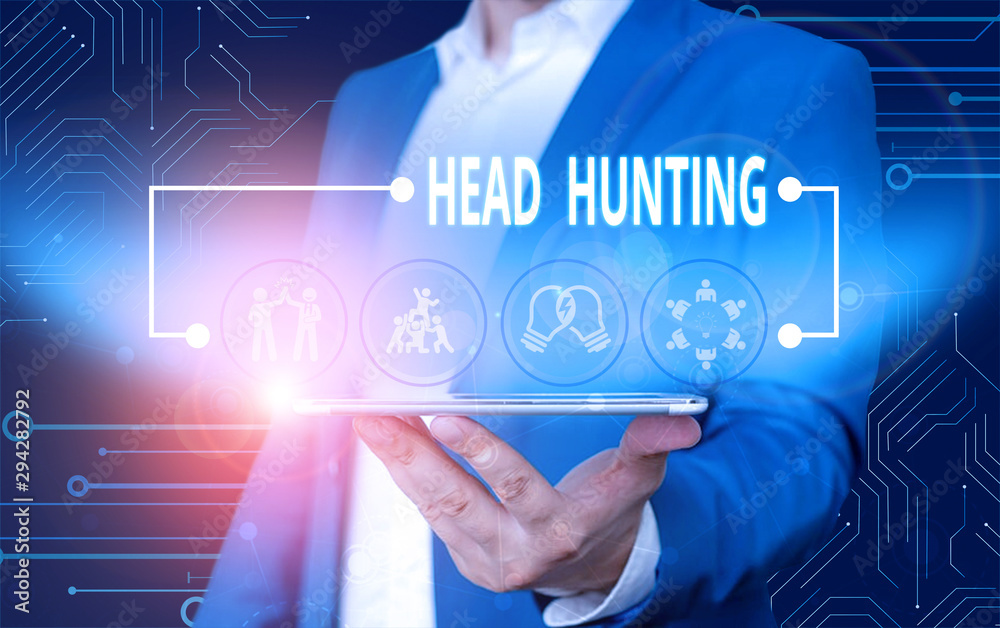 Text sign showing Head Hunting. Business photo text process of recruitment of a prospective or potential employee Male human wear formal work suit presenting presentation using smart device Text sign showing Head Hunting. Business photo text process of recruitment of a prospective or potential employee Male human wear formal work suit presenting presentation using smart device